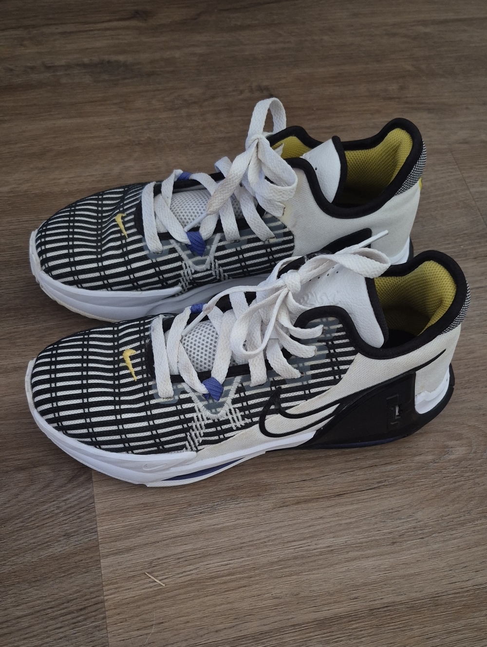 Nike Black & White Low-Top Athletic Sneakers with Yellow Lining